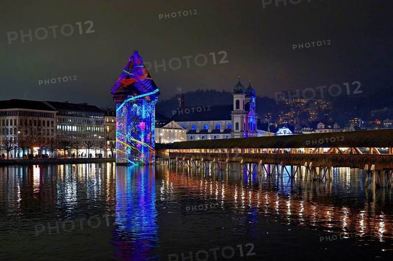 Wassertum with light installation, Chapel Bridge on the right, Jesuit Church on the Reuss at dusk behind, Old Town, Lilu, Light Festival 2025, Lucerne, Canton of Lucerne, Switzerland
