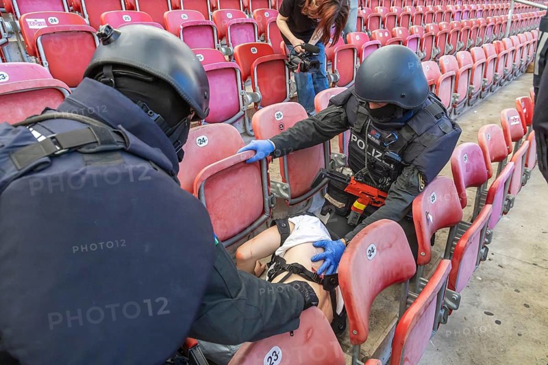 Baden-Württemberg police anti-terror exercise in the stadium. In the run-up to the European Football Championships, 1200 police officers rehearse for an emergency. Scenario: stabbing in the stands of the MHP Arena, VfB Stuttgart's stadium, which is also the venue for five European Championship matches. After initial treatment by the police, the handover of the injured to the emergency services and fire brigade was also rehearsed. Stuttgart, Baden-Württemberg, Germany