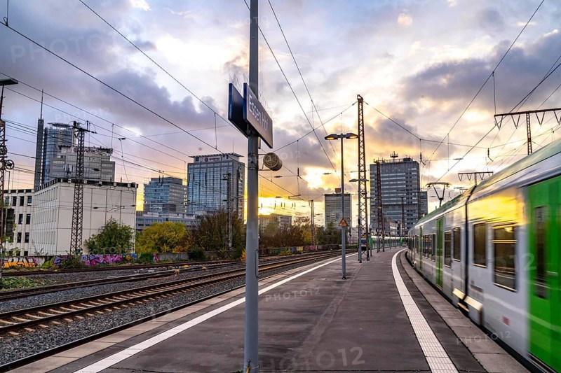Regional train arriving at Essen central station, platform, city centre skyline, North Rhine-Westphalia, Germany