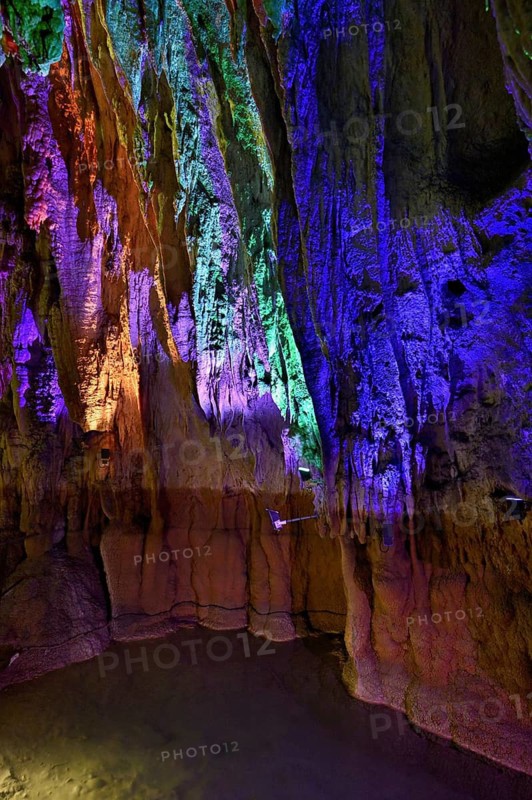 Stalactites illuminated by coloured LED light, stalactite cave, Höllgrotten, Baar, Canton Zug, Switzerland