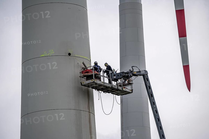 Preparation for the demolition of the tower of a 20 year old wind turbine, in the Werl wind farm, 5 old Enercon E-66 turbines are demolished, 2 new Siemens SG6.6-170 wind turbines replace them, the WTGs produce twice as much energy, 12 MW power, as the 5 old wind turbines, called repowering, Werl, North Rhine-Westphalia, Germany