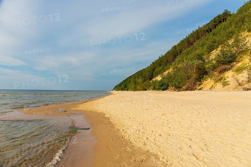 Beach at sunset, close to Miedzyzdroje (Misdroy), a village in Kamien Pomorski County, West Pomeranian Voivodeship, in northern Poland and the Wolin National Park