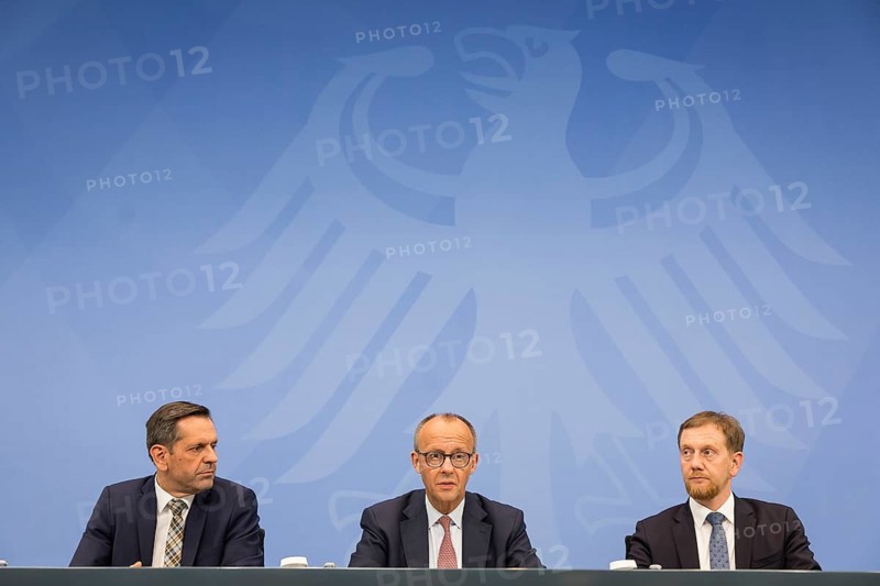 Olaf Lies (SPD, Minister President of Lower Saxony), Friedrich Merz (CDU, Federal Chancellor) and Michael Kretschmer (CDU, Minister President of the Free State of Saxony) during a press conference after the consultation between Federal Chancellor Friedrich Merz and the heads of government of the federal states at the Federal Chancellery, Berlin, 18 June 2025
