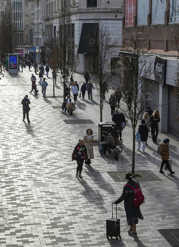 Shoppers walking on pedestrianised Eliot Street in city centre, Liverpool, England, UK
