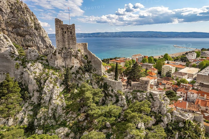 The old town centre of Omis with the ruins of the Mirabella or Peovica fortress seen from above, Croatia