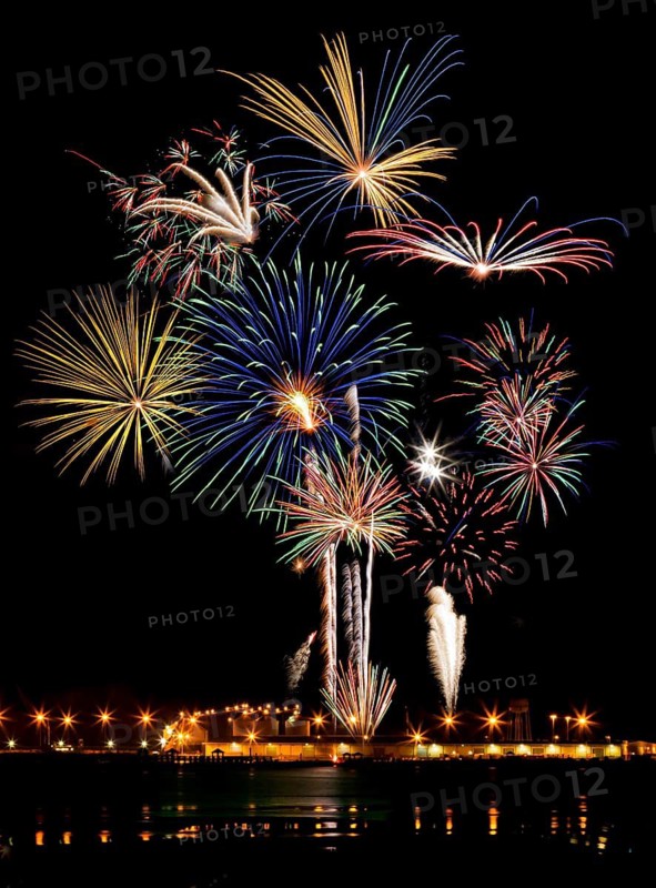 Fourth of July fireworks over the Mississippi Sound at the harbor in Gulfport, Mississippi, USA