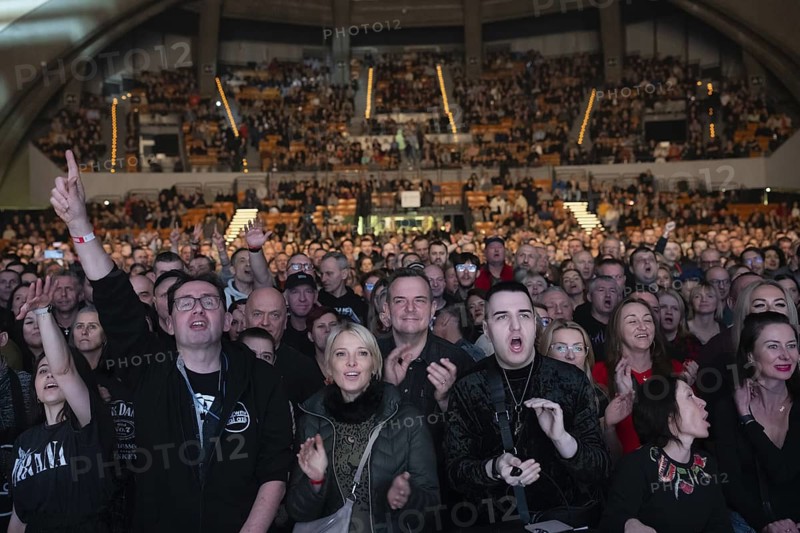 WROCLAW, POLAND - JANUARY 10, 2024: Crowd of people in front of the scene during concert Call the Militia