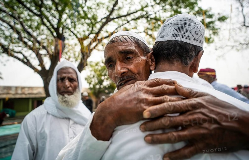 KAYAKUCHI, INDIA - MARCH 31: Muslims greet eachother after perform Eid al-Fitr prayer at Eidgah in Kayakuchi, India on March 31, 2025. Muslims around the world are celebrating the Eid al-Fitr holiday, which marks the end of the fasting month of Ramadan