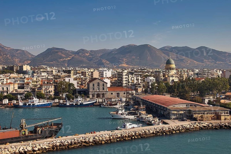 Coastal town with port and ships, surrounded by mountainous landscape, old ferry port in the center of Patras, ferries, Patras, Peloponnese, Greece