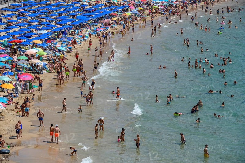 Many tourists at Playa Levante, Benidorm, Alicante province, Costa Blanca, Spain