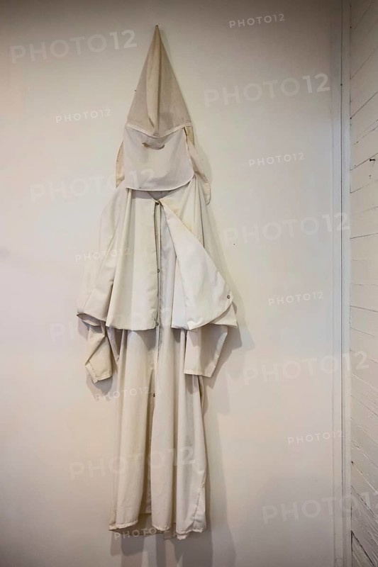 Greensboro, Alabama - The Safe House Black History Museum. A Ku Klux Klan robe, donated to the museum by a Klansman who repented. The museum is based in a house where Dr Martin Luther King Jr took refuge while being hunted by the Ku Klux Klan shortly before his assassination. The museum documents the local struggle for equality