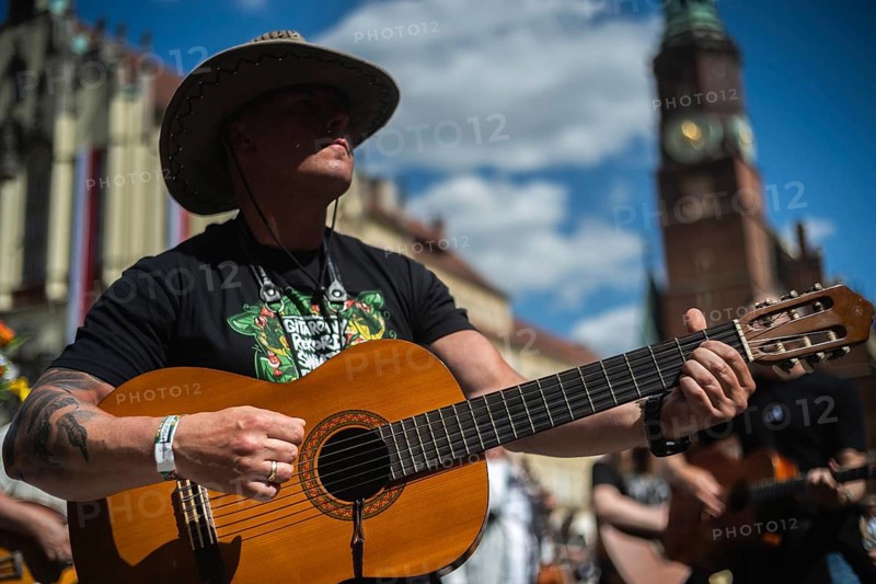 WROCLAW, POLAND - MAY 1, 2025: World Guitar Record concert, 8122 participants played Jimi Hendrix's song Hey Joe on guitars in the Wroclaw market square