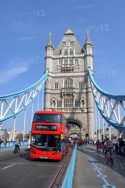 Red double-decker bus on Tower Bridge, London, England, United Kingdom