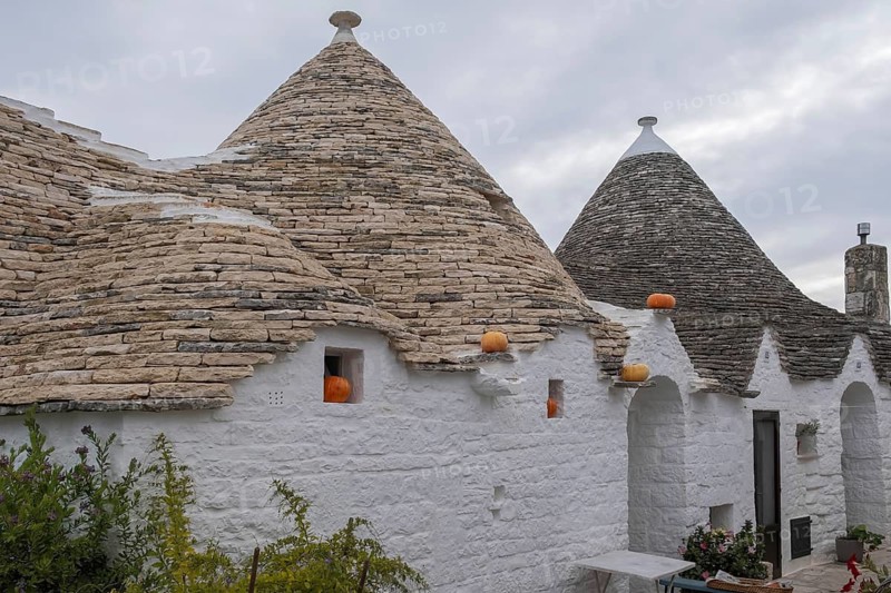 Trulli house decorated with pumpkins, Alberobello, UNESCO World Heritage Site, Apulia, Italy