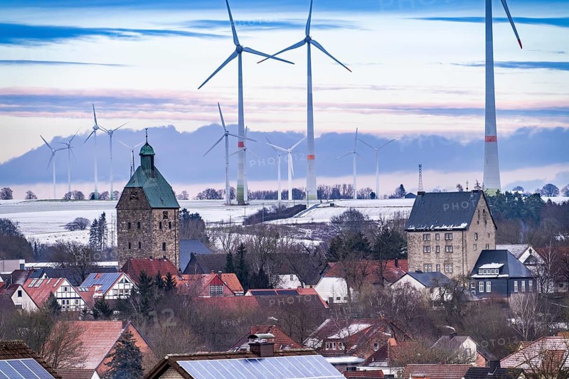 The town of Lichtenau, self-proclaimed energy town, wind farm, over 190 wind turbines and over 1200 solar panels generate 10 times as much electricity as the community of 11, 900 inhabitants consumes, largest onshore cluster of wind turbines in Germany, winter, slightly snow-covered landscape, North Rhine-Westphalia, Germany