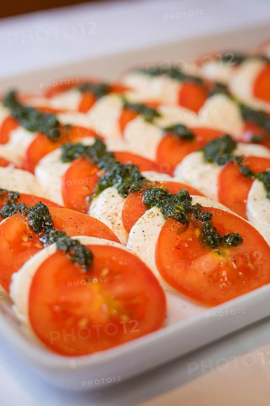 Fresh tomato slices with mozzarella and herbs on a tray, Europäischer Hof, Königsbach Stein, Germany