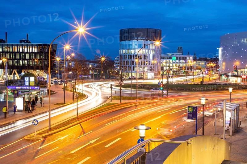 Evening city traffic in Essen, Germany, large intersection, roundabout, Berliner Platz, Berlin Square, this area would also be affected by a diesel driving ban, Essen, North Rhine-Westphalia, Germany