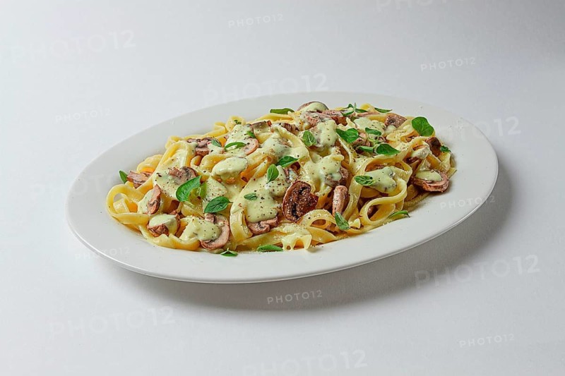 Fettuccine with champignons, basil, in cream sauce, homemade, no people