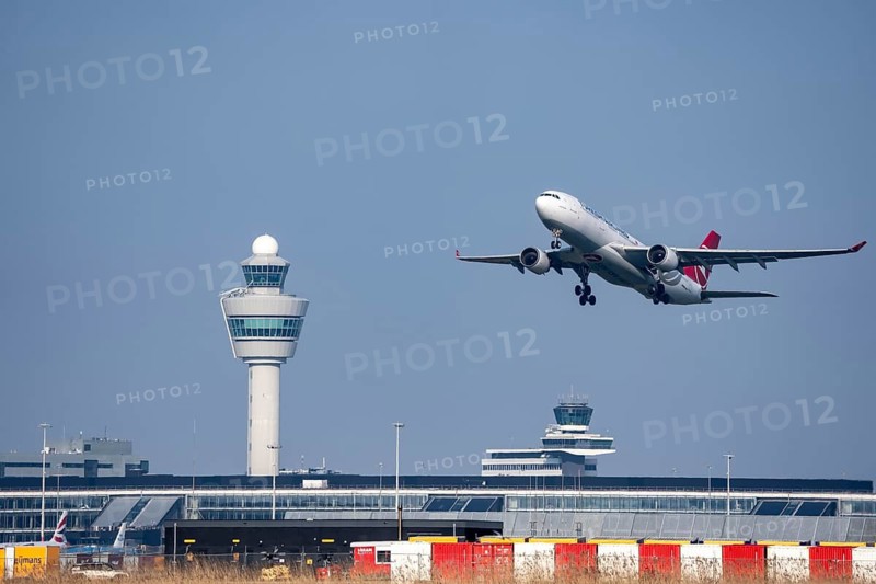 Turkish Airways Airbus A330 aircraft takes off from Kaagbaan runway, 06/24, at Amsterdam Schiphol Airport, AMS, Air Traffic Control Tower, Netherlands