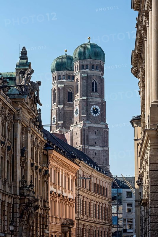 Bell towers of the Gothic Church of Our Lady, Cathedral of Our Lady, neo-baroque bank building by Albert Schmidt and baroque palace, Kardinal-Faulhaber-Straße, Old Town, Munich, Upper Bavaria, Bavaria, Germany