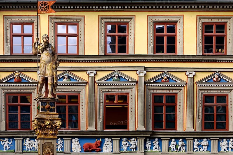 The statue Romans in front of the Haus zum Roten Ochsen, a very beautiful Renaissance building, Fischmarkt, Erfurt, Thuringia, Germany