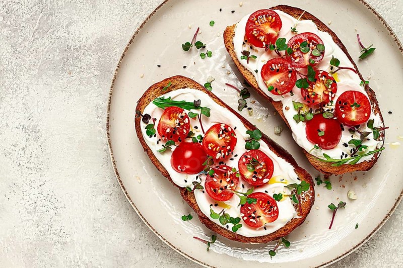 Sandwiches with cream cheese and cherry tomatoes, breakfast, homemade