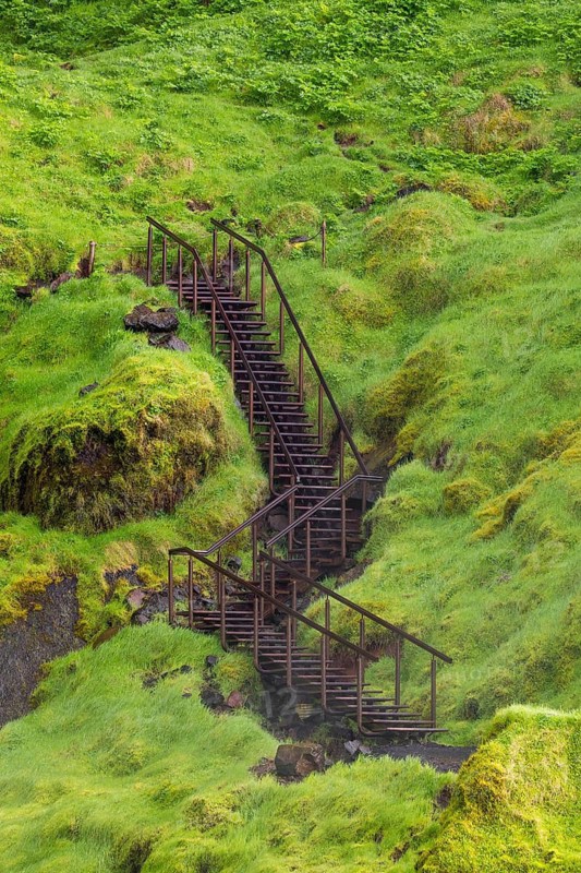 Stairway to Waterfall Seljalandsfoss, 60 m high, located in southern iceland