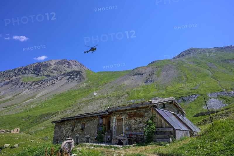 Helicopter supply flight for the Chalet refuge de Chamoissiére, Villar-d'Arêne, Département Hautes-Alpes, France