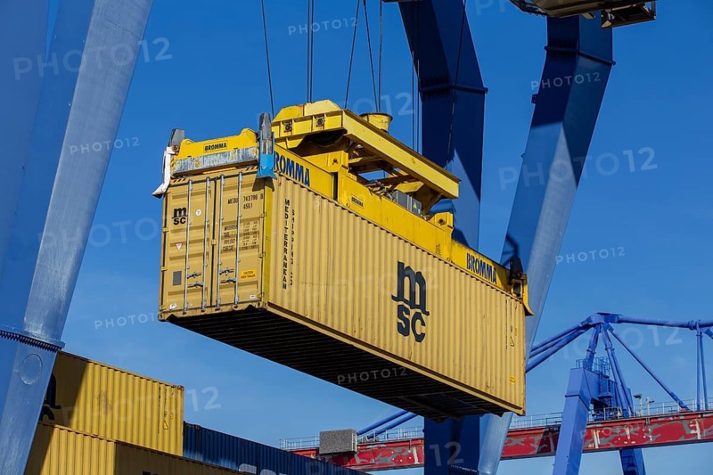 11 April 2024, Mannheim: A container from the Mediterranean Shipping Company (MSC) is loaded at the port