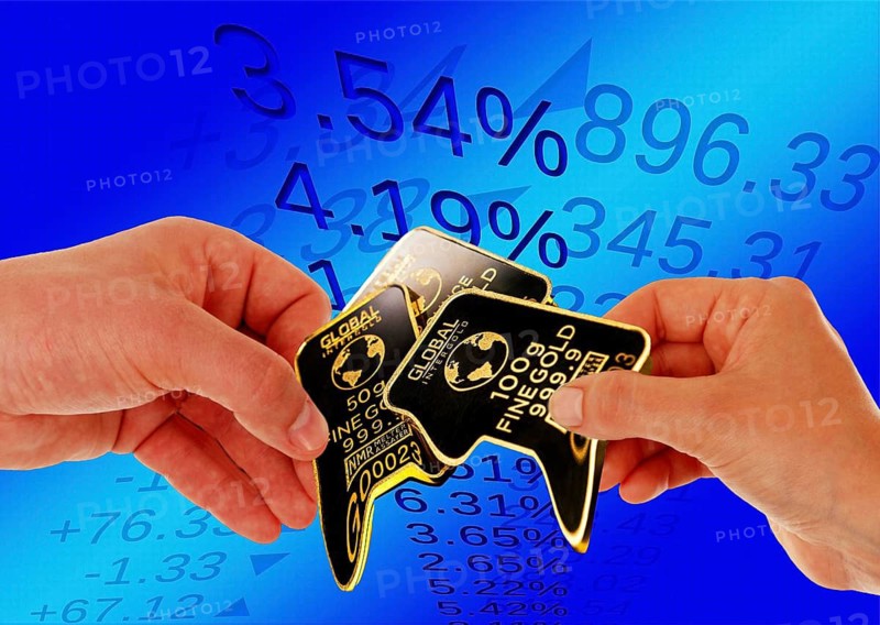 Symbolic image, gold as an investment, soft currency, security, risk, stock market, securities, industry, economy critical, exploitation, stress, trade union, payment, insolvency, wrong decisions, unemployment, profit, profit slump, share prices, Germany as a business location, global economy, globalisation, environmental protection, mining rights