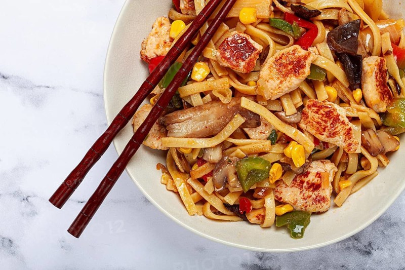 Fried noodles with chicken meat and vegetables, Bami Goreng, Indonesian dish, no people