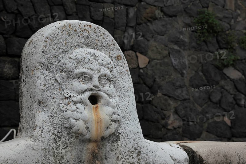 Drinking water fountain in the ruined city of Herculaneum, Campania, Italy