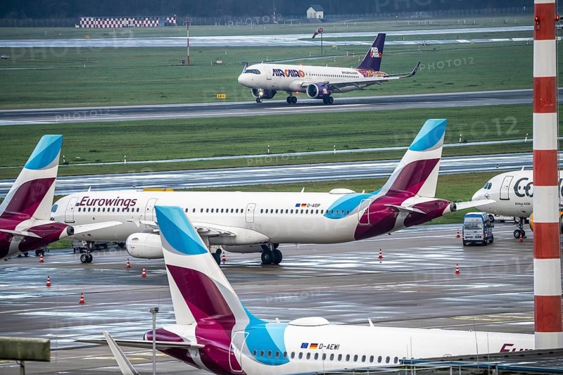 Düsseldorf Airport, Eurowings aircraft on the apron, Air Cairo aircraft landing, Düsseldorf, North Rhine-Westphalia, Germany