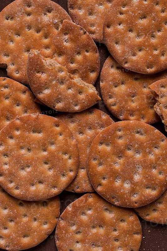 Crispbread, round, with salt and herbs, top view, food concept, no people