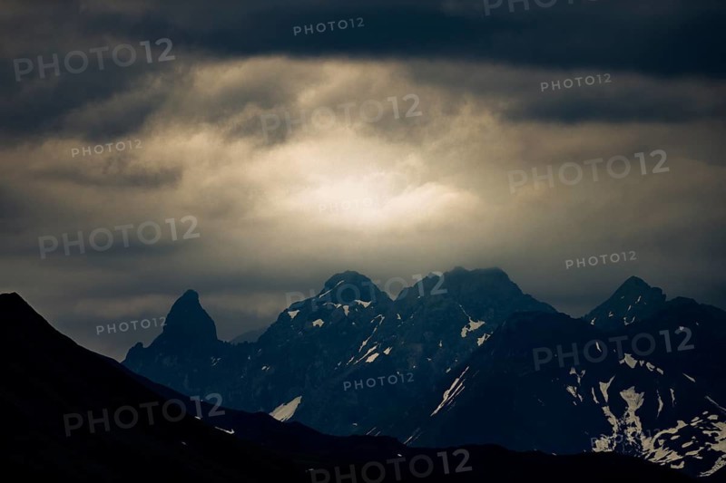 Summit of the Allgäu Alps in the morning light with dramatic clouds, Lech, Lechquellengebirge, Vorarlberg, Austria