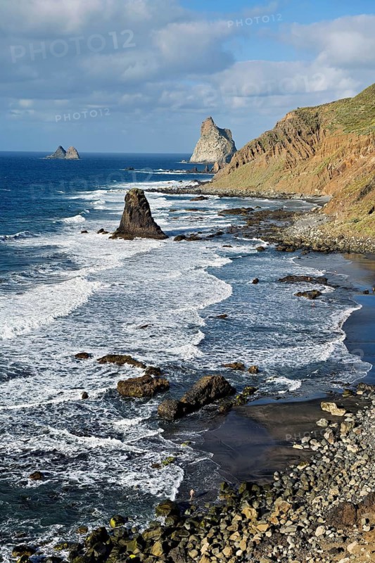 Beach of Playa de Benijo at high tide with the rock Roques de Anaga, Tenerife, Canary Island, Spain