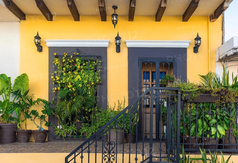 Mexico, Mazatlan, Colorful old city streets in historic city center near El Malecon promenade, ocean shore Zona Hotelera Hotel Zone and central Mazatlan Basilica cathedral