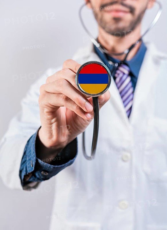Armenia health and medical insurance concept. Armenia healthcare system, doctor holding stethoscope