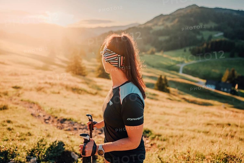 Summer trail running and hiking in the Alps on the Riedberg Pass between Obermaiselstein and Balderschwang in the Allgäu, Bavaria, Germany