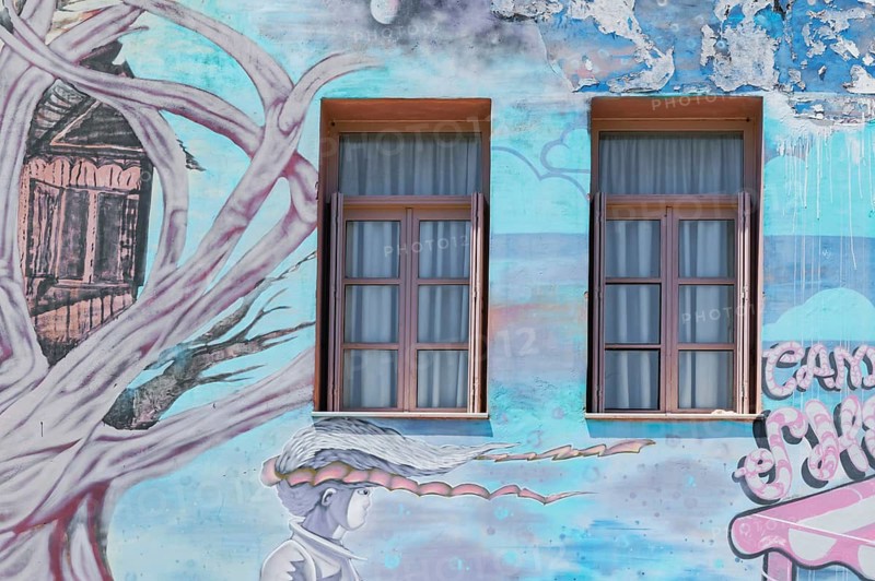 Old house painted with murals, Petychakis square, Rethymno, Crete, Greek Islands, Greece