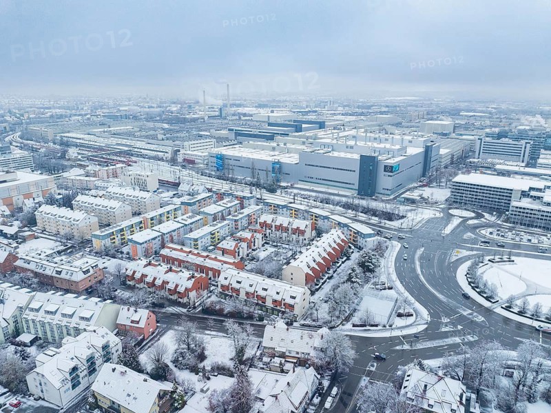 Industrial area in a wintry urban environment with snow-covered roofs, Sindelfingen, Germany