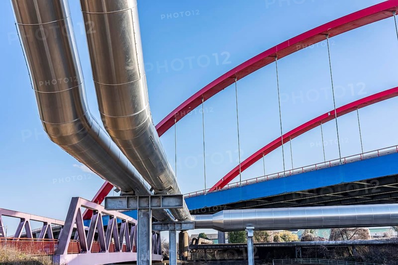 Iqony district heating pipes at the city port, crosses the Rhine-Herne Canal in Essen, A42 motorway bridge, North Rhine-Westphalia, Germany