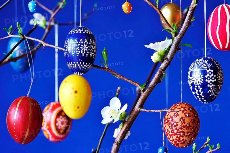 Easter, Easter bouquet with colorful Easter eggs, branches with flowers of an ornamental quince, spring, Germany
