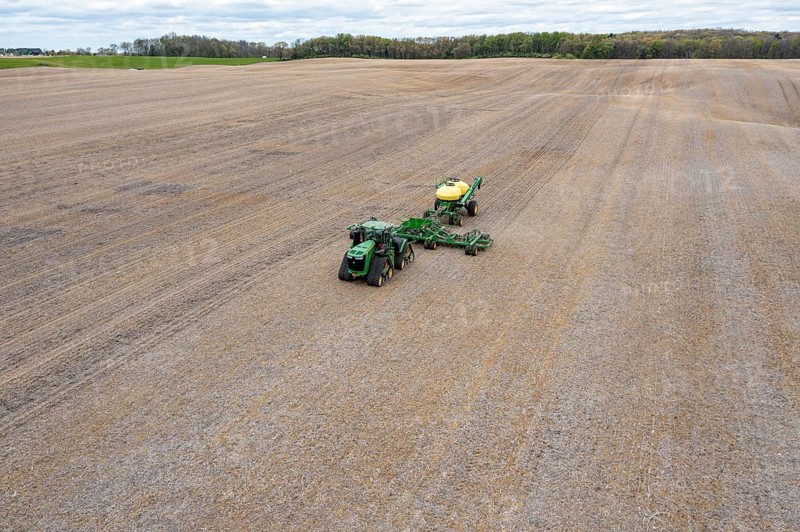 Grass Lake, Michigan - A farmer applies liquid fertilizer to a farm field in early spring. The war in Iran and the blockage of the Strait of Hormuz have dramatically raised the price of fertilizer and the cost of diesel fuel used in farm equipment