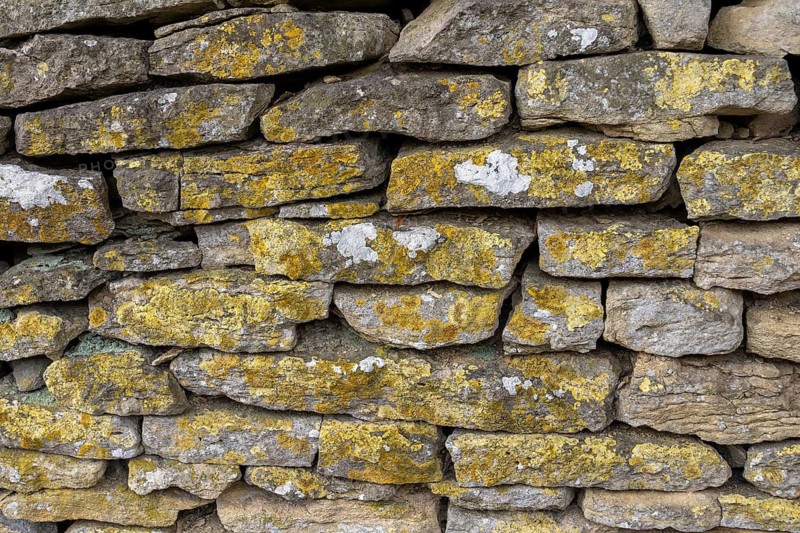 Stone wall, Bibury, The Cotswolds, England, Great Britain