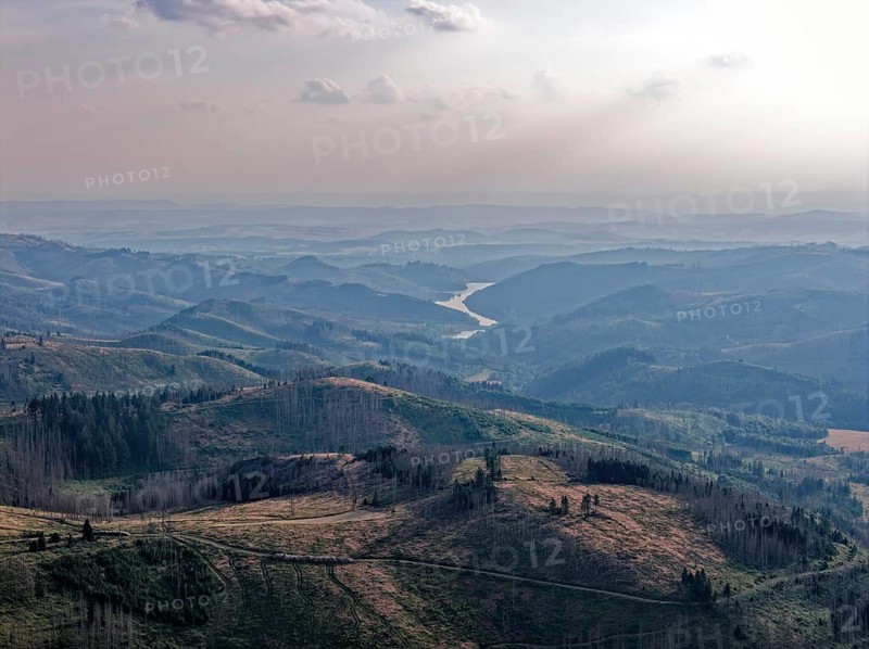 Evening mountain scenery in the Harz nature park Park, and in the Fernel the Sösestausee. aerial view. Harz, Landkreis Goslar, Lower Saxony, Germany