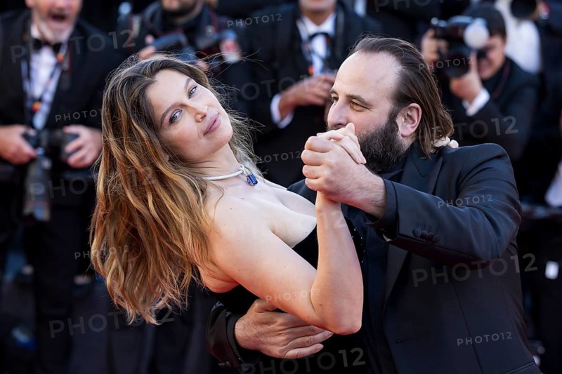 Laetitia Casta and Vincent Macaigne dance with Karma on the Red Carpet of the Palais des Festivals et des Congrès during the 79th Cannes International Film Festival. The 79th Cannes International Film Festival will take place from May 12 to 23, 2026