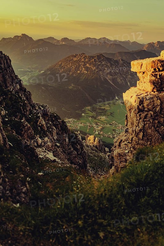 Thaneller summit at sunset in the Lechtal valley in Tyrol with a wonderful view of the surrounding mountains. Tyrol, Austria