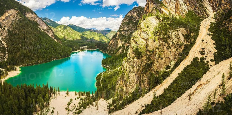 Aerial panorama view Lago di Braies lake in Dolomites mountains. Dolomiti. Italian alps.Turquoise lake in northern Italy. Popular summer visit destination Europe. Glacier alpine lake - Pragser Wildsee