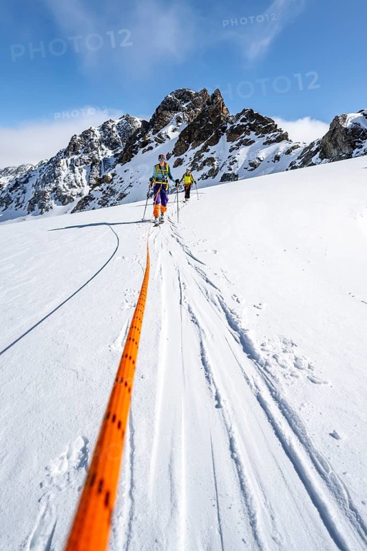 Ski tourer with rope, rope team on the Vadret da Porchabella glacier on the ascent to the summit of Piz Kesch, mountain landscape in winter, alpine tour, ski tour Bündner Haute Route, Albula Alps, Rhaetian Alps, Grisons, Eastern Switzerland, Switzerland